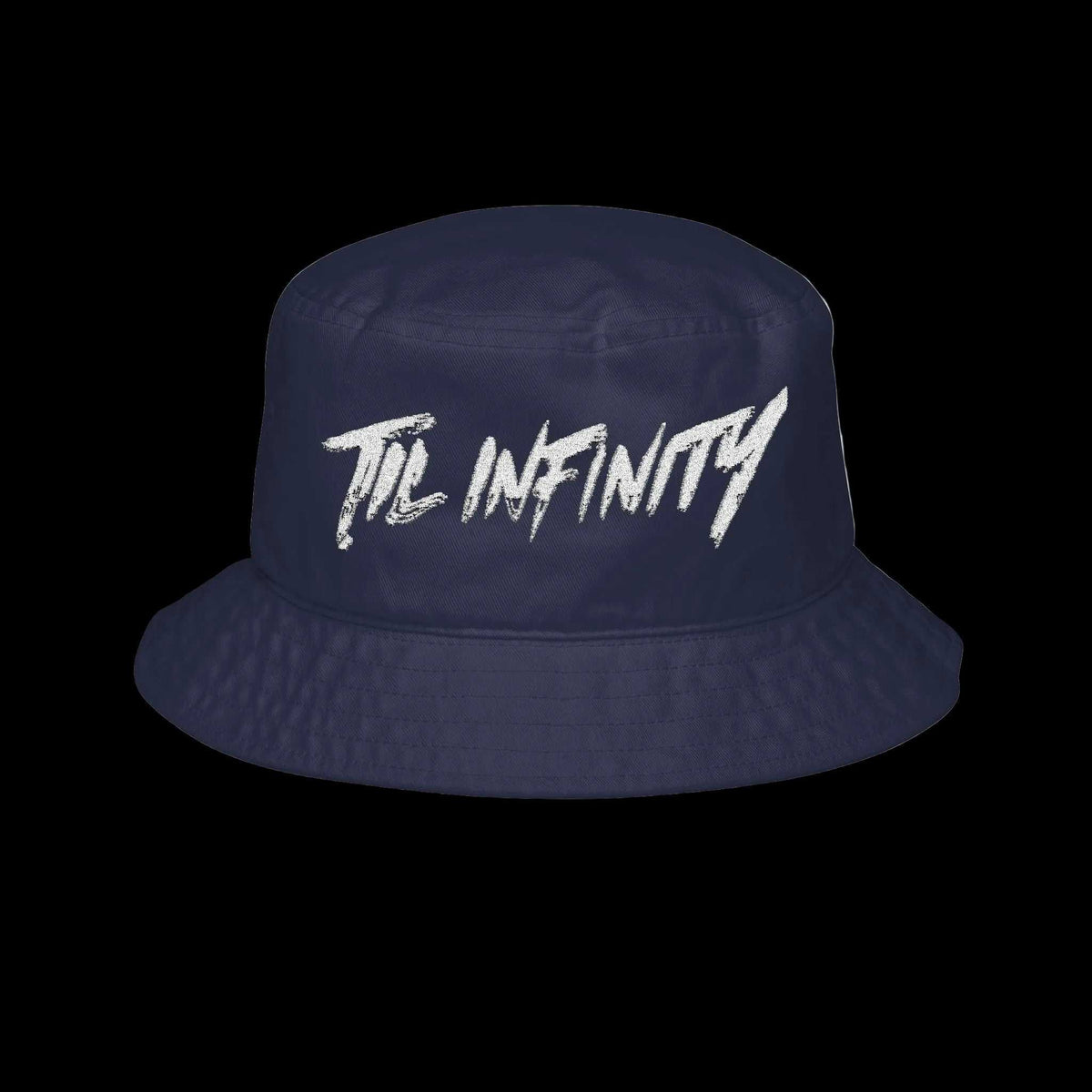 Bucket hat in dark navy cotton twill, featuring a wide stitched brim and bold white TIL INFINITY "Solidtude" lettering across the crown.